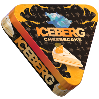 Side view of ICEBERG Cheesecake 40mg (50mg/g) nicotine pouches triangular tin with dessert graphics and blue polar bear logo.