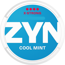 ZYN Cool Mint X-Strong 11mg nicotine pouch can with blue label and white branding on a black background.